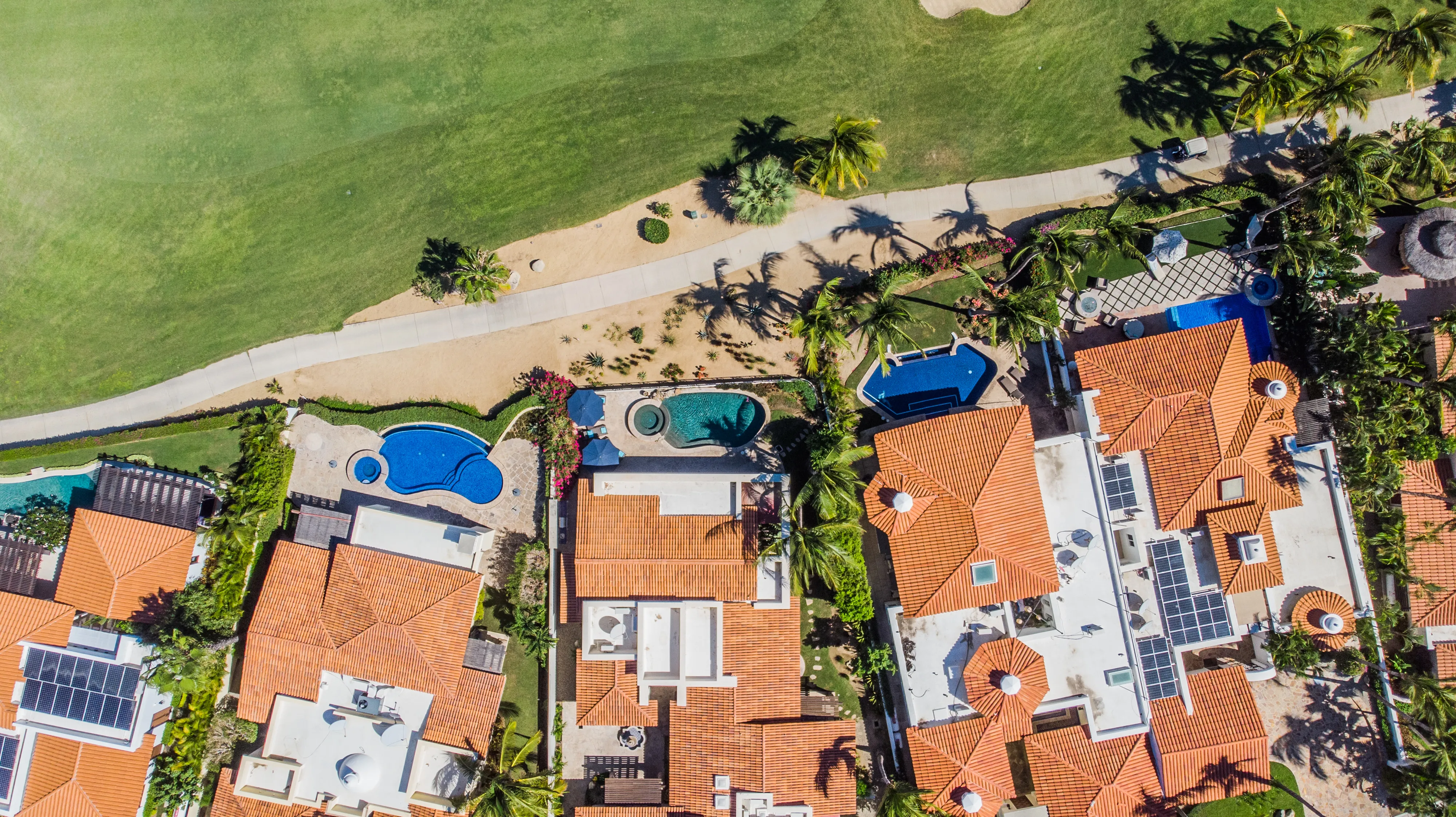 Breathtaking panoramic aerial view of multi-million dollar custom luxury estates in Palmilla overlooking the Sea of Cortez.