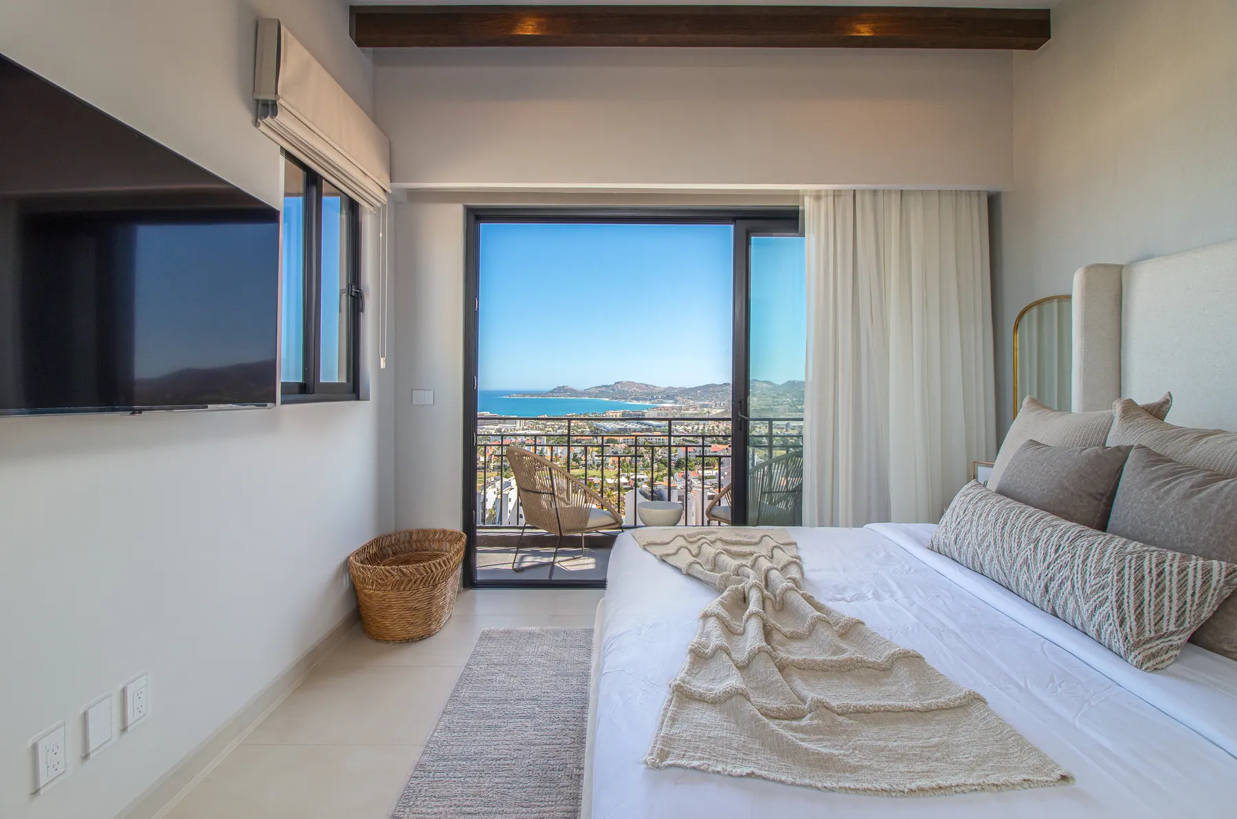 CENIT primary bedroom with ocean view