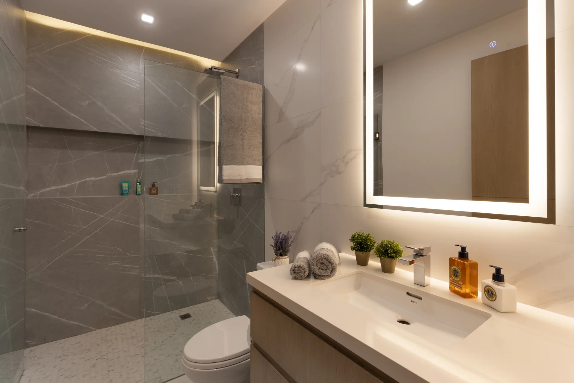 OCEANA model residence bathroom with gray stone