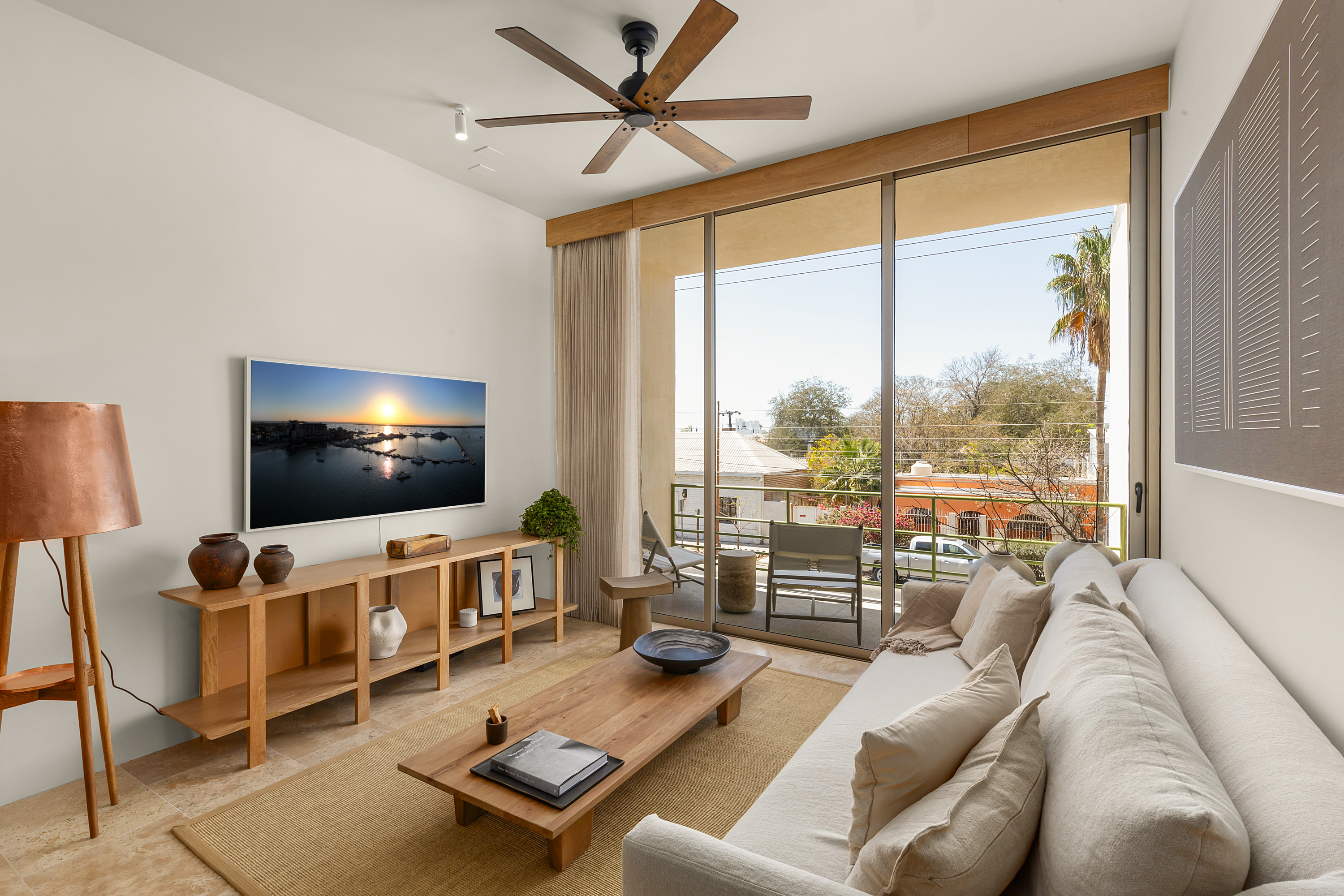 Living room and balcony at SANCTA residences in Downtown La Paz