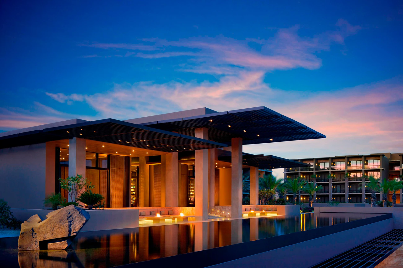 Nighttime view of the modern architectural design and expansive reflecting pools at the JW Marriott Los Cabos Beach Resort within Puerto Los Cabos. Nighttime view of the modern architectural design and expansive reflecting pools at the JW Marriott Los Cabos Beach Resort within Puerto Los Cabos.
