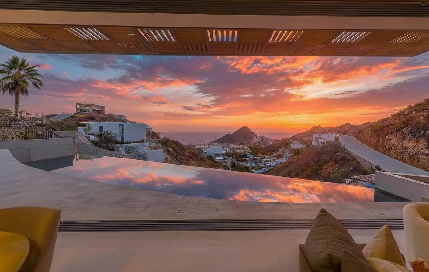 Dramatic Pacific sunset and Land's End Arch views from the luxury terrace of Villa Vista Cortez in Pedregal.