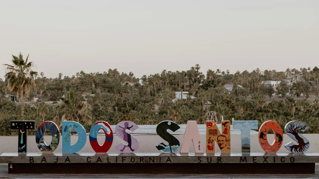 Landscape with a word formed by 3D letters that says “Todos los Santos”.