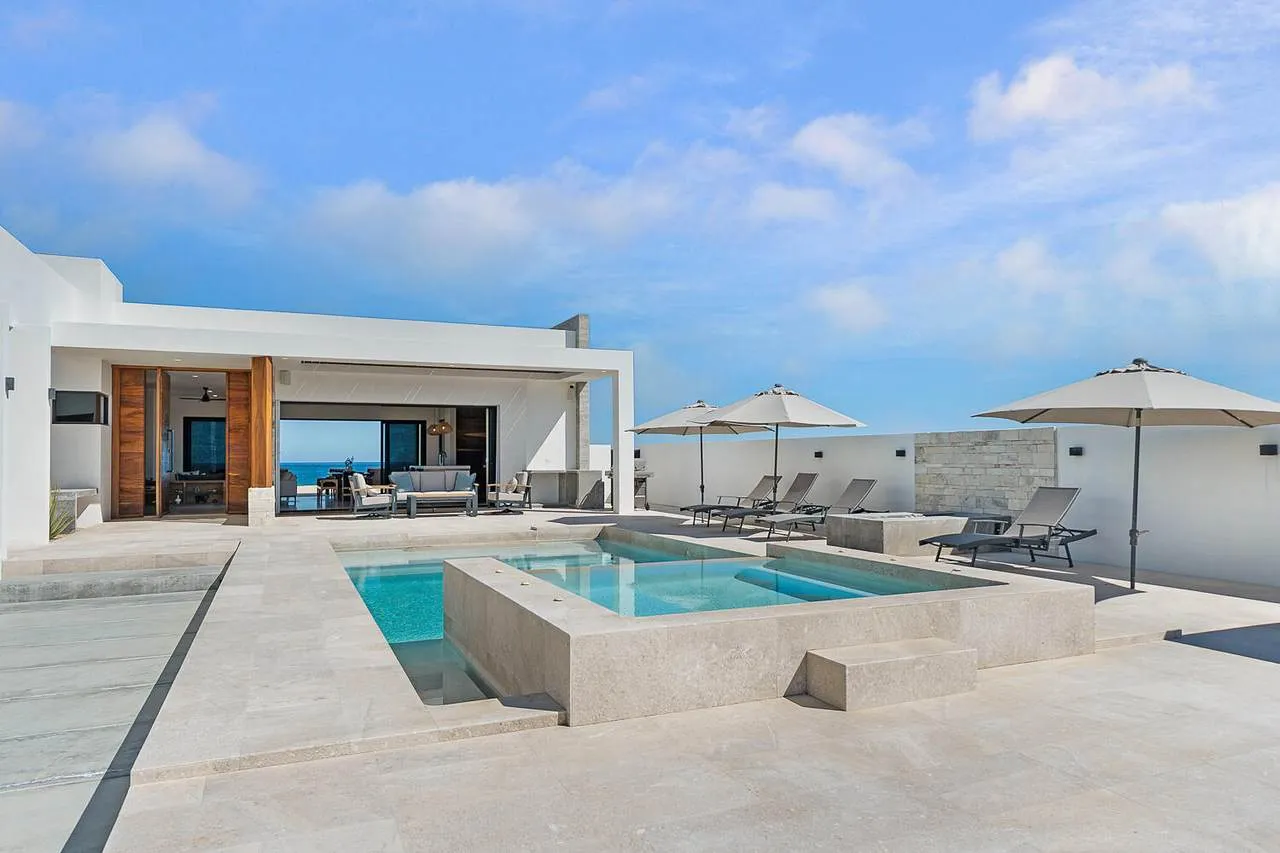 Luxury villa architecture designed with setbacks and natural buffers for maximum privacy in Baja.